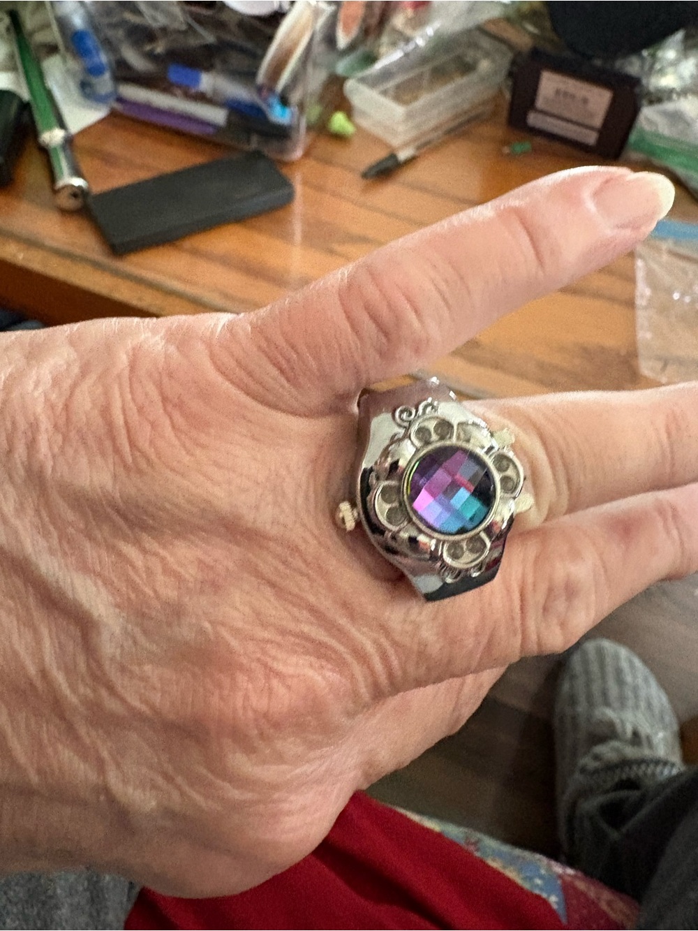 Silver-tone Fashion Ring Watch with Iridescent Purple gem. Size 5 stretch